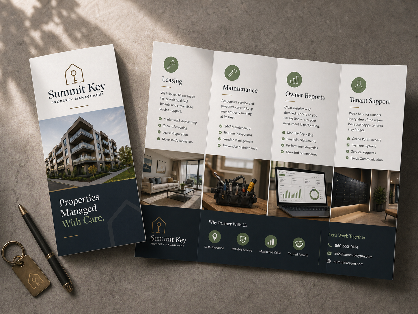 Elegant brand-neutral tri-fold brochures arranged on a refined tabletop.